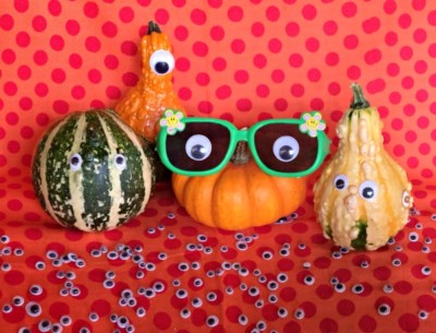DIY Googlyween Halloween Decoration. Use your craft stash and the dollar store for a fun centerpiece.