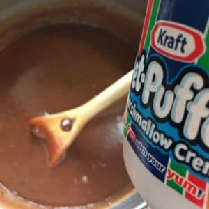 Close up image of Jet Puffed marshmallow creme and fudge cooking in a pot.