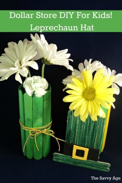 Two popsicle stick vases with flowers and popsicle stick leprechaun hat.