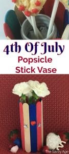 Red white and blue popsicle stick vase with white carnations.