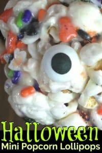 close up of a Halloween popcorn ball with a candy eyeball