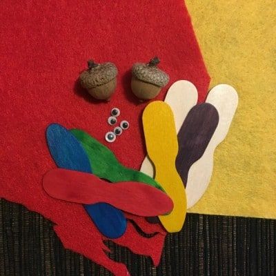Red and yellow felt, googly eyes, acorns for popsicle stick turkey craft.