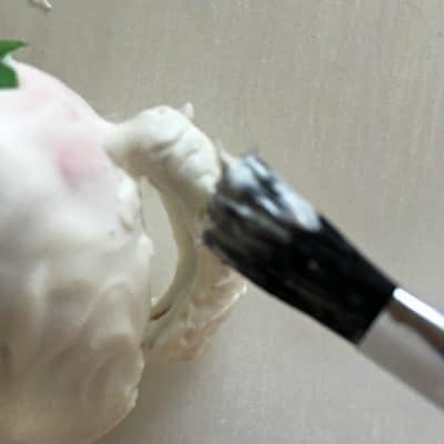 Painting strawberry handle.