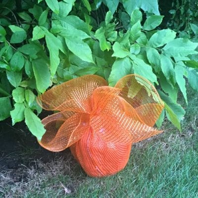Orange mesh covered recycled pumpkin