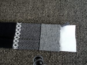 Black and white sock with a paper towel.