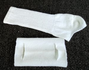 White athletic socks cut into a face mask.