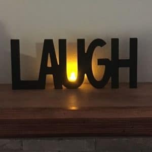 Wood block letters on mantle