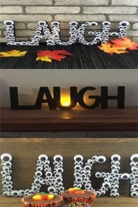 Block letters of Laugh on mantle painted black with a tea light, laugh wood sign made of googly eyes with Halloween red, orange cupcakes and leaves.