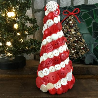 Christmas Button Tree made of a cone filled with red and white buttons.